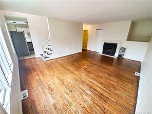 Spacious townhouse in desirable Annex area of New Haven with garage located underneath.