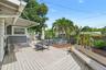 Step outside to a spacious deck with room for outdoor dining, lounging, and entertaining beneath the Florida sunshine.