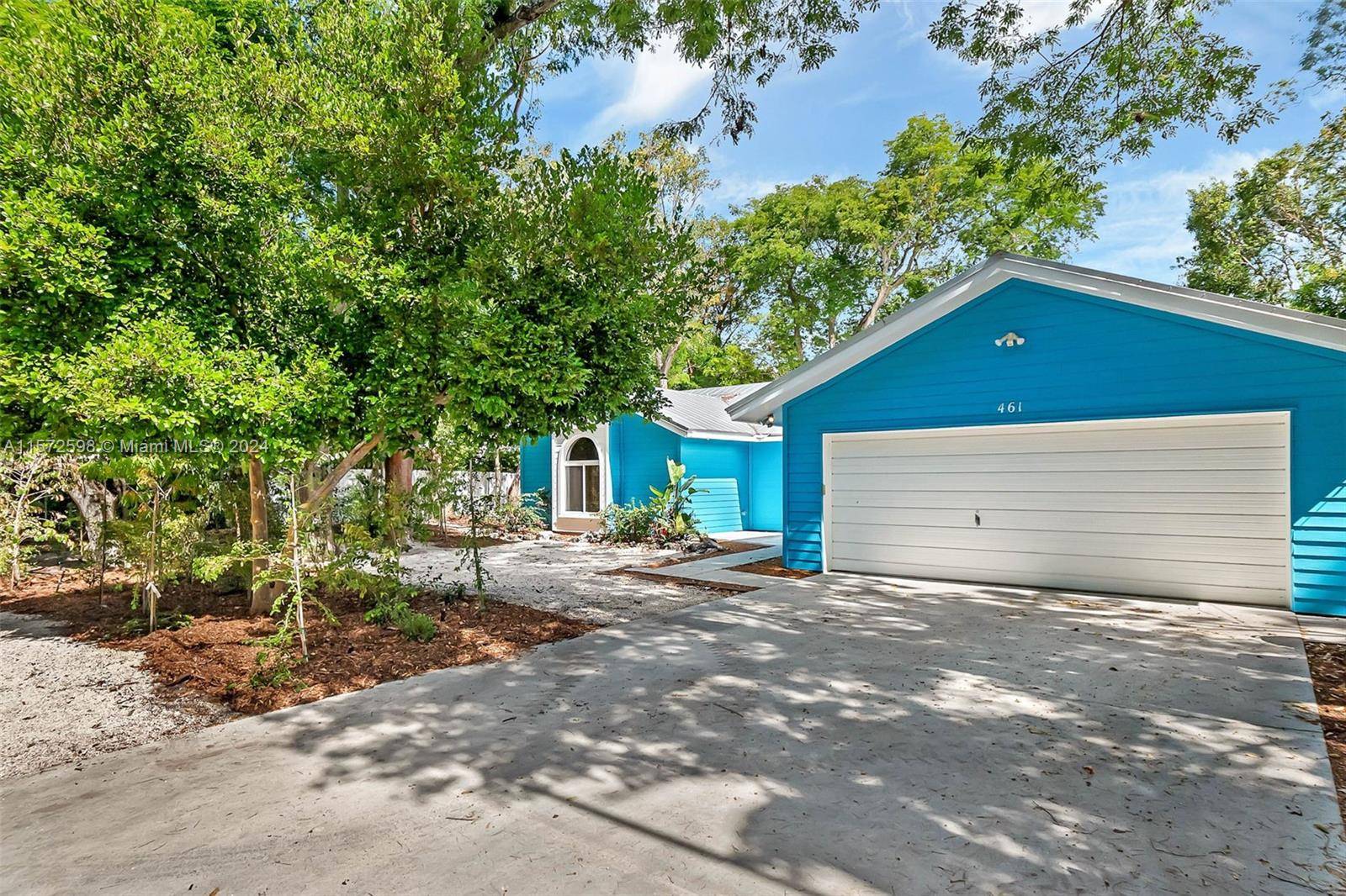 Welcome to your dream home nestled on two spacious lots offering privacy and tranquility on one of the most sought after streets in Key Largo.
