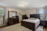 Master bedroom. Hardwood-style flooring throughout