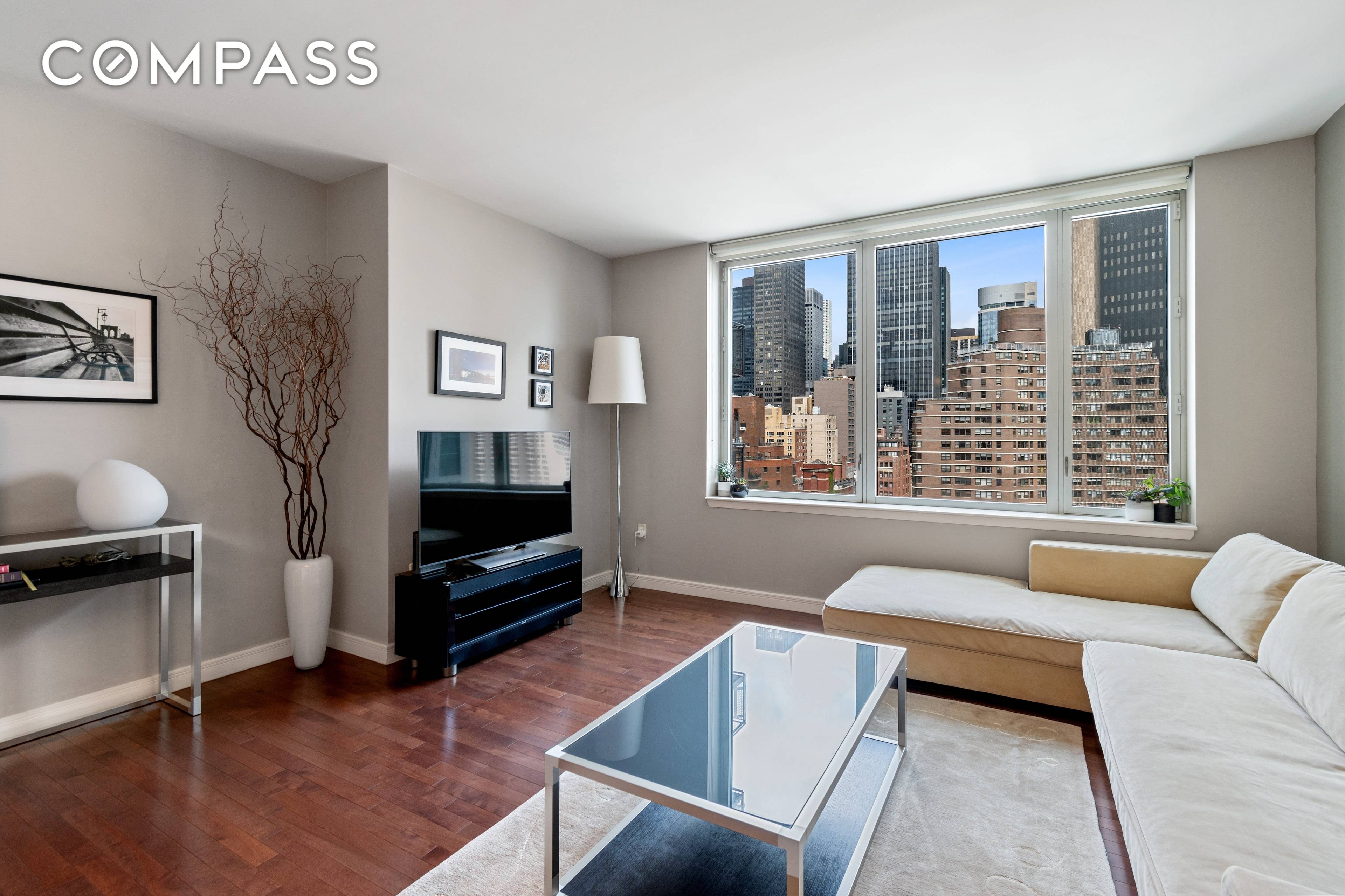 Open skyline views and tons of sunlight shine through the oversized windows of this extra large one bedroom.