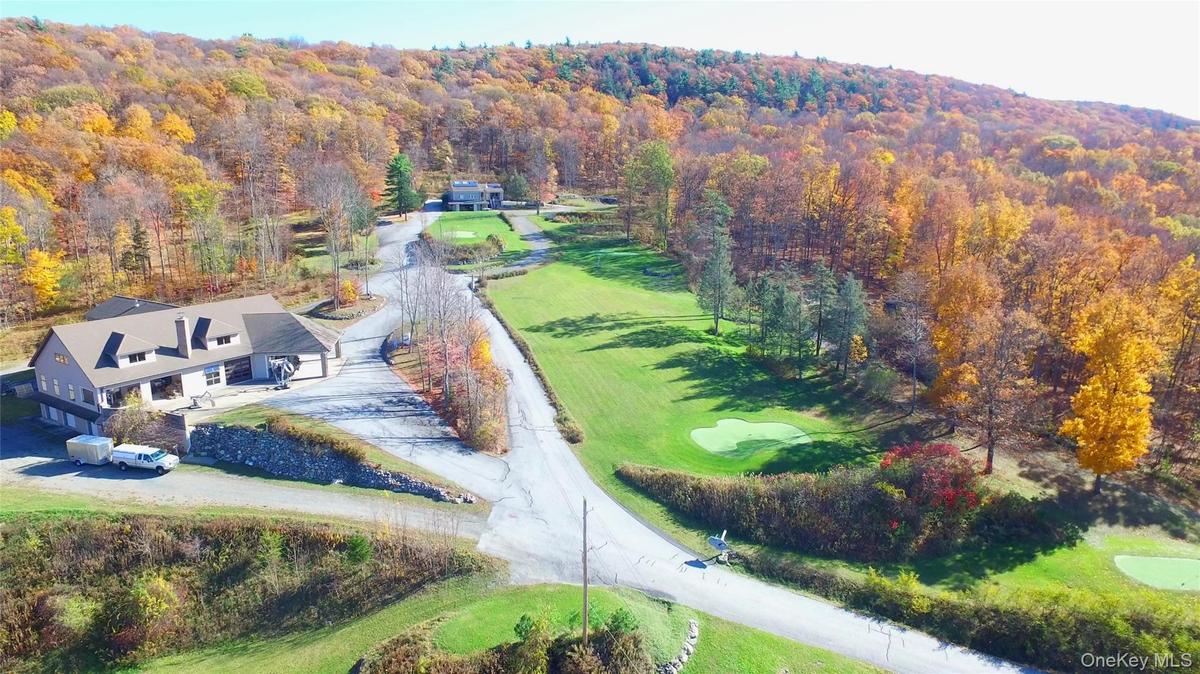 Commit to purchasing 58 Strang (on the left) and the owner may consider a larger purchase with additional home and over 13+ additional acres.