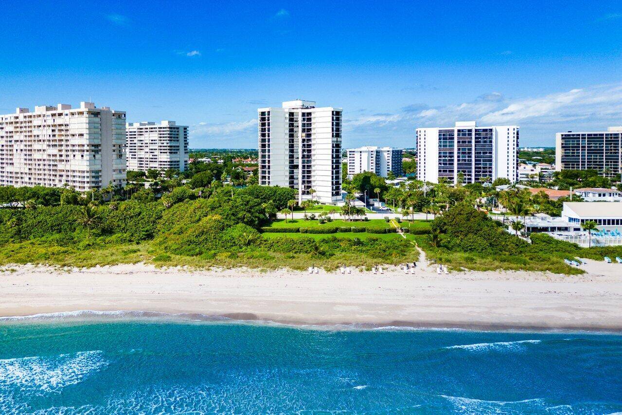 Stunning direct ocean, city and intracoastal views surround this spectacular corner coastal contemporary residence.