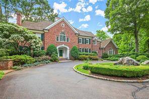Welcome to this lush paradise in New Canaan's coveted westside neighborhood !