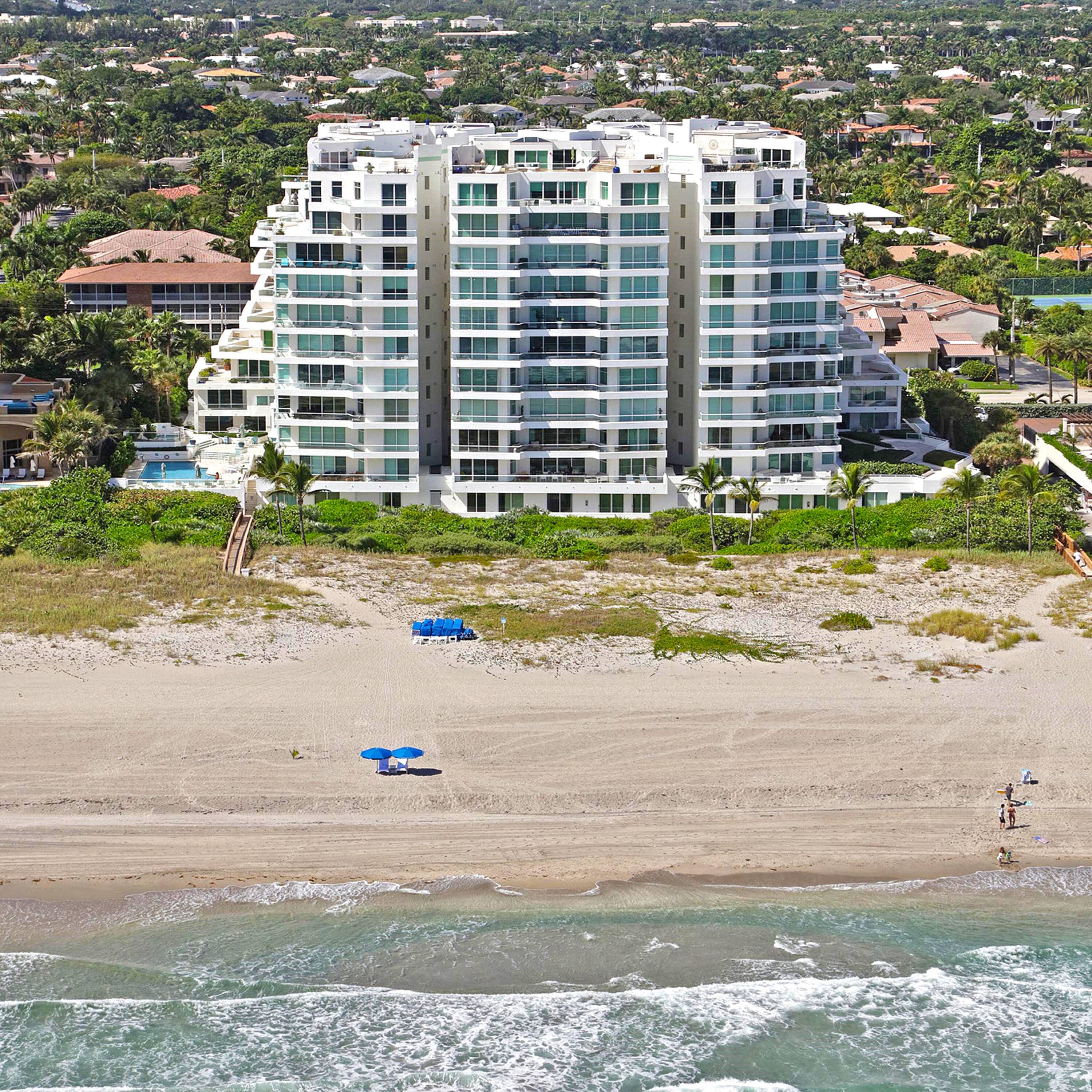Magnificent Southeast Corner Oceanfront Residence with a Wrap Around Terrace is now available at the prestigious Aragon sited Directly on the Sand in Boca Raton.