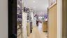 Hall with recessed lighting and light wood-style flooring