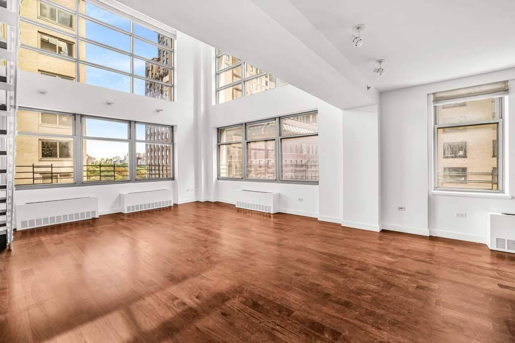 Dramatic Duplex with Central Park Views Just One Block from the Park This rarely available 3 bedroom, 3.