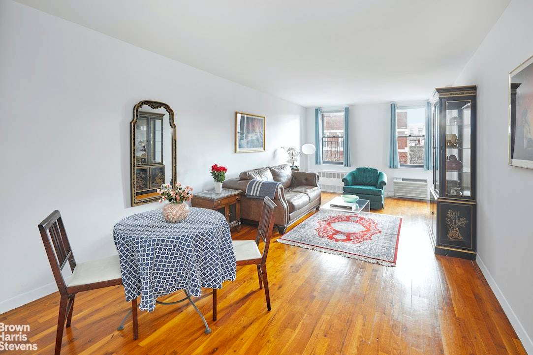 Top floor, south facing with a private balcony, 6G at 315 West 55th St.