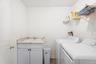 Laundry room featuring a sink and washer and dryer