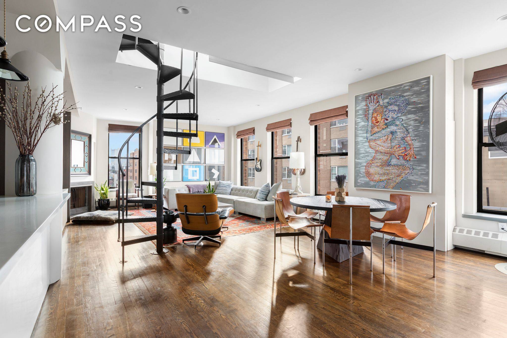 This meticulously designed corner loft penthouse is located in the heart of Noho.