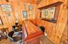 Office space with wooden walls and bar area