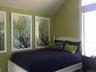 Bedroom with vaulted ceiling