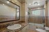 Hall bathroom featuring a built-in tub with glass enclosure, white framed window, and recessed lighting