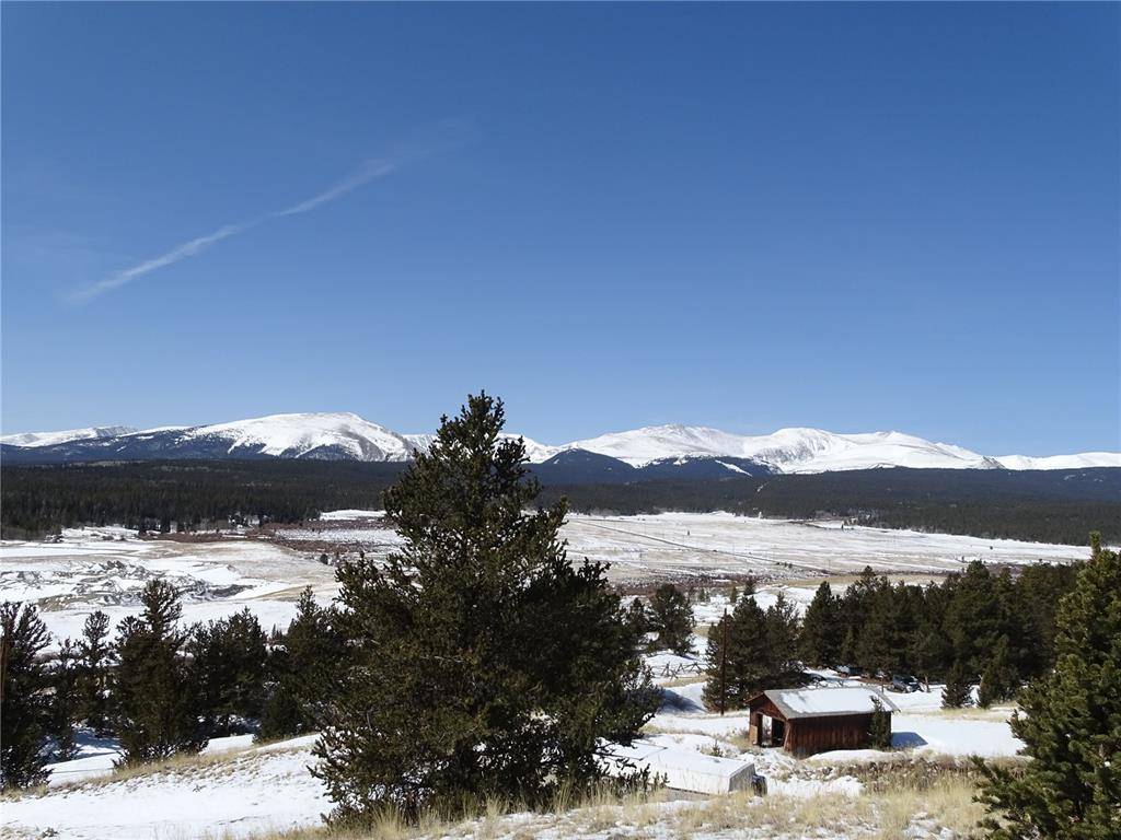 Over 3 acres of up sloping, south west facing land on sunny and coveted Beaver Ridge, with to die for views of the Mosquito Range and mature trees.