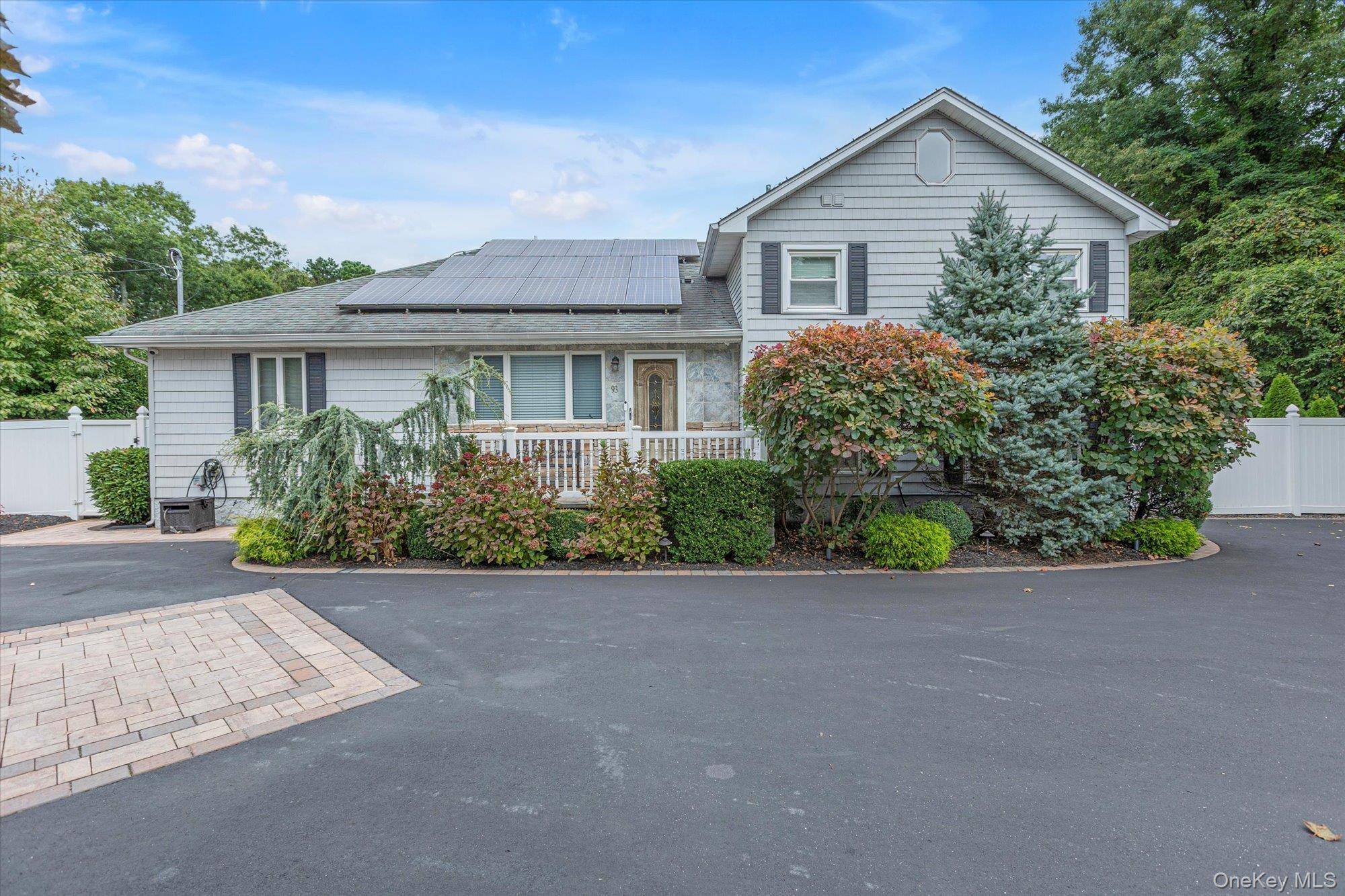 Welcome to this thoughtfully renovated 4 bedroom, 4 bathroom split level, ideally set on nearly an acre of private, park like grounds.