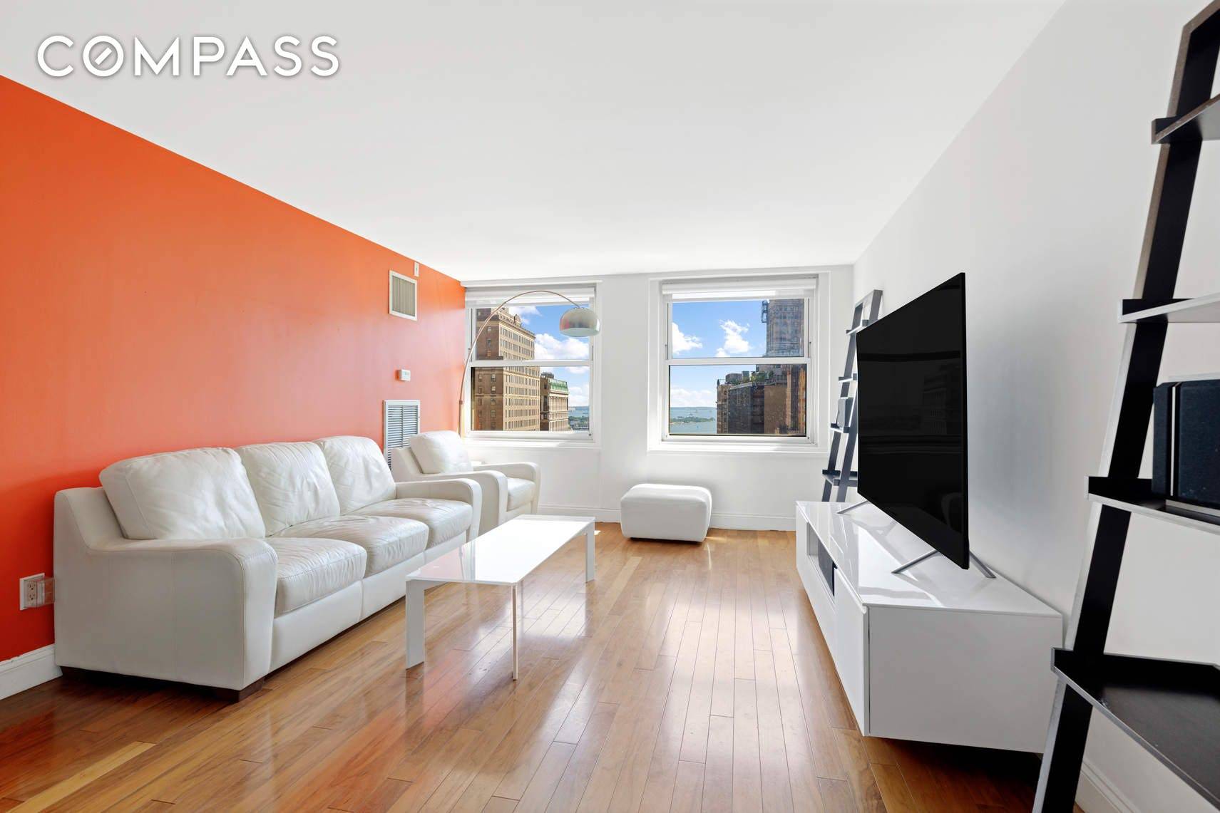 Welcome home to this sunny and bright two bedroom, two bathroom apartment at 88 Greenwich Street !