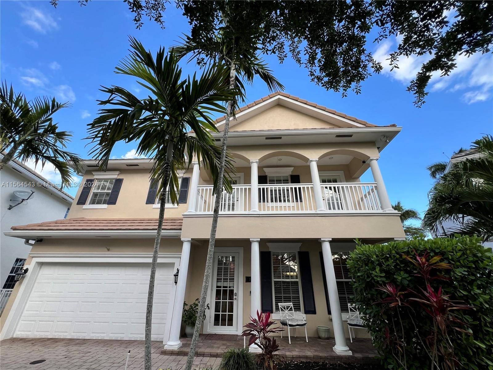 Stunning Two Story Georgian Style home located in La Preserve, a private gated community in East Fort Lauderdale.