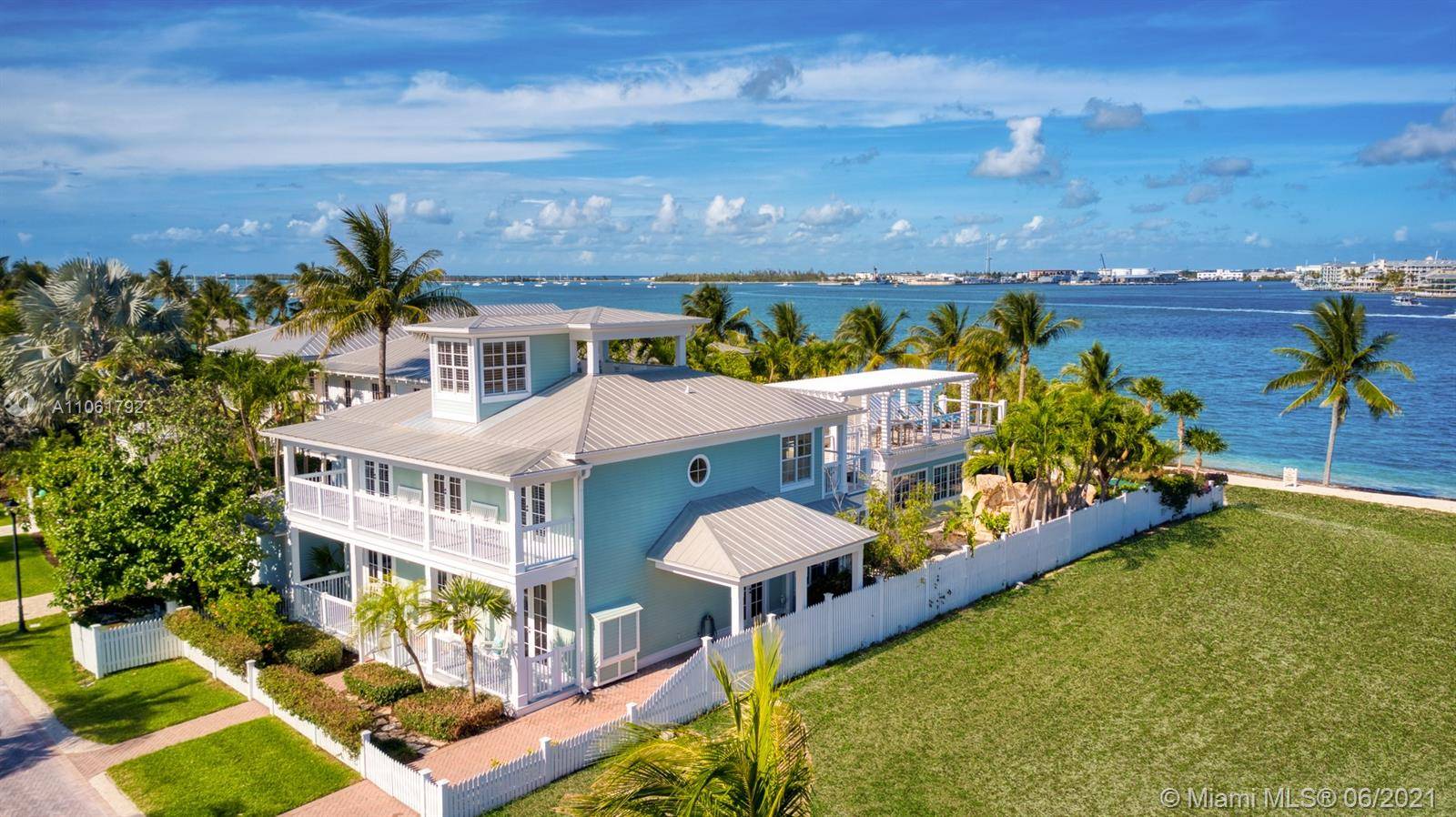 ESCAPE TO PARADSIE ! 32 Sunset Key is an oceanfront property with private beach, harbor views facing Mallory Square.