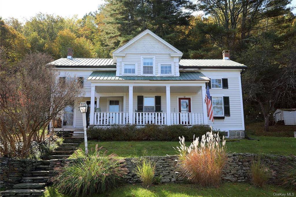 Classic and elegant this charming farmhouse sits up high with a lovely view of the Delaware River.