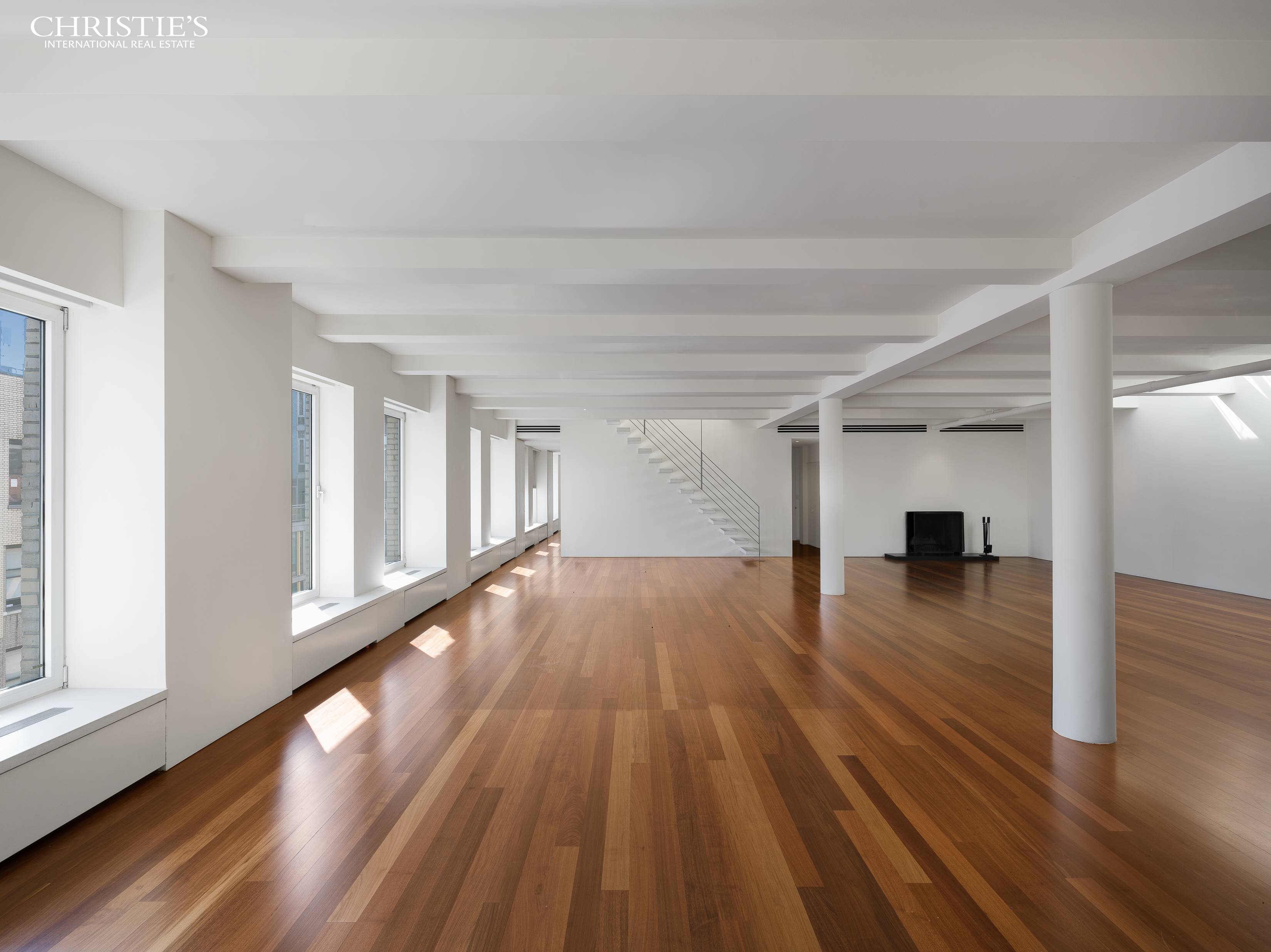 DRAMATIC PENTHOUSE WITH PRIVATE ROOF This 4, 800 SF sun flooded, full floor Penthouse loft features a rare expanse of 120' feet of open south facing frontage on West 17th ...