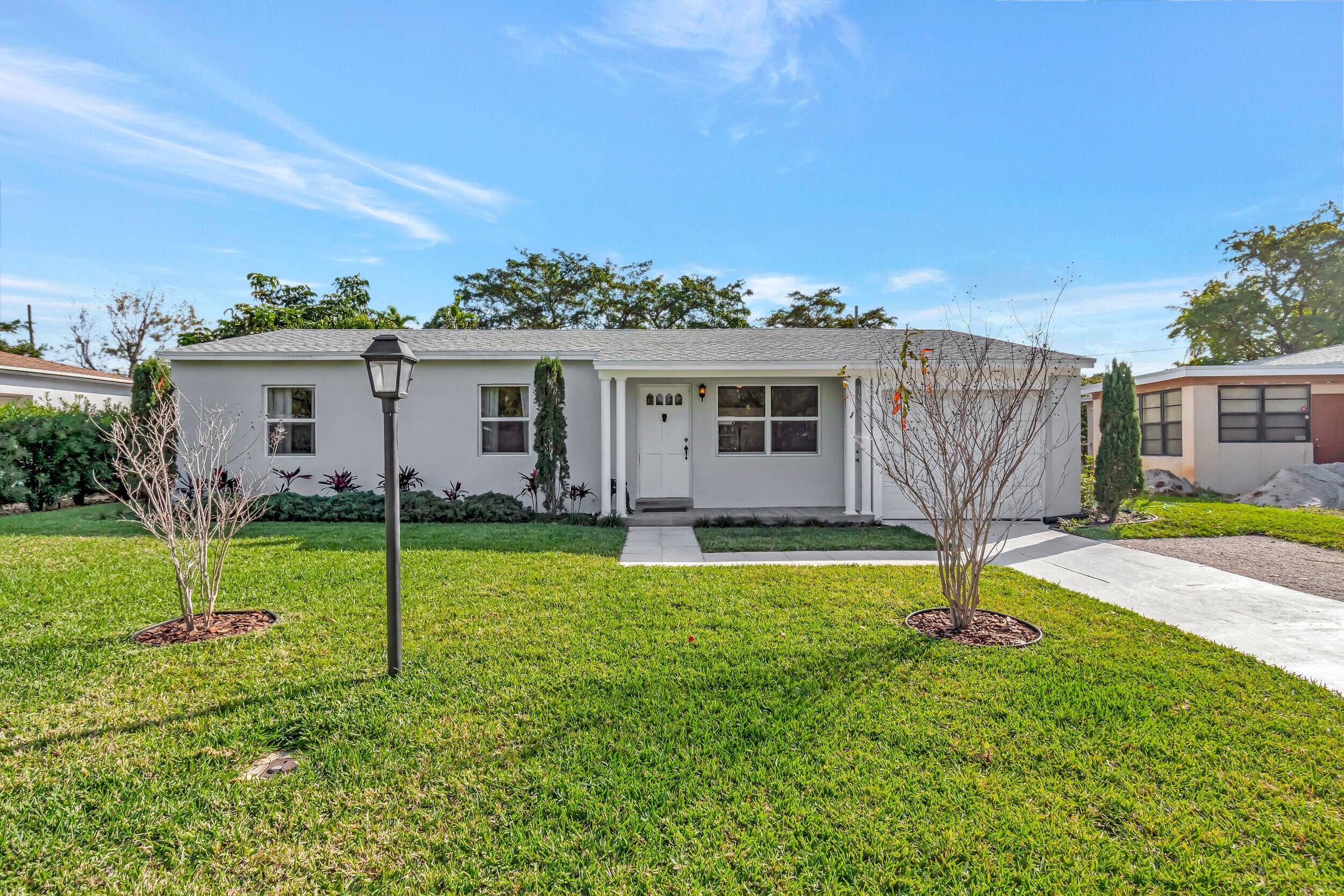 Nestled on a quiet block in Seacrest Park in the vibrant community of East Delray Beach, this charming home offers the perfect blend of coastal living and urban convenience.