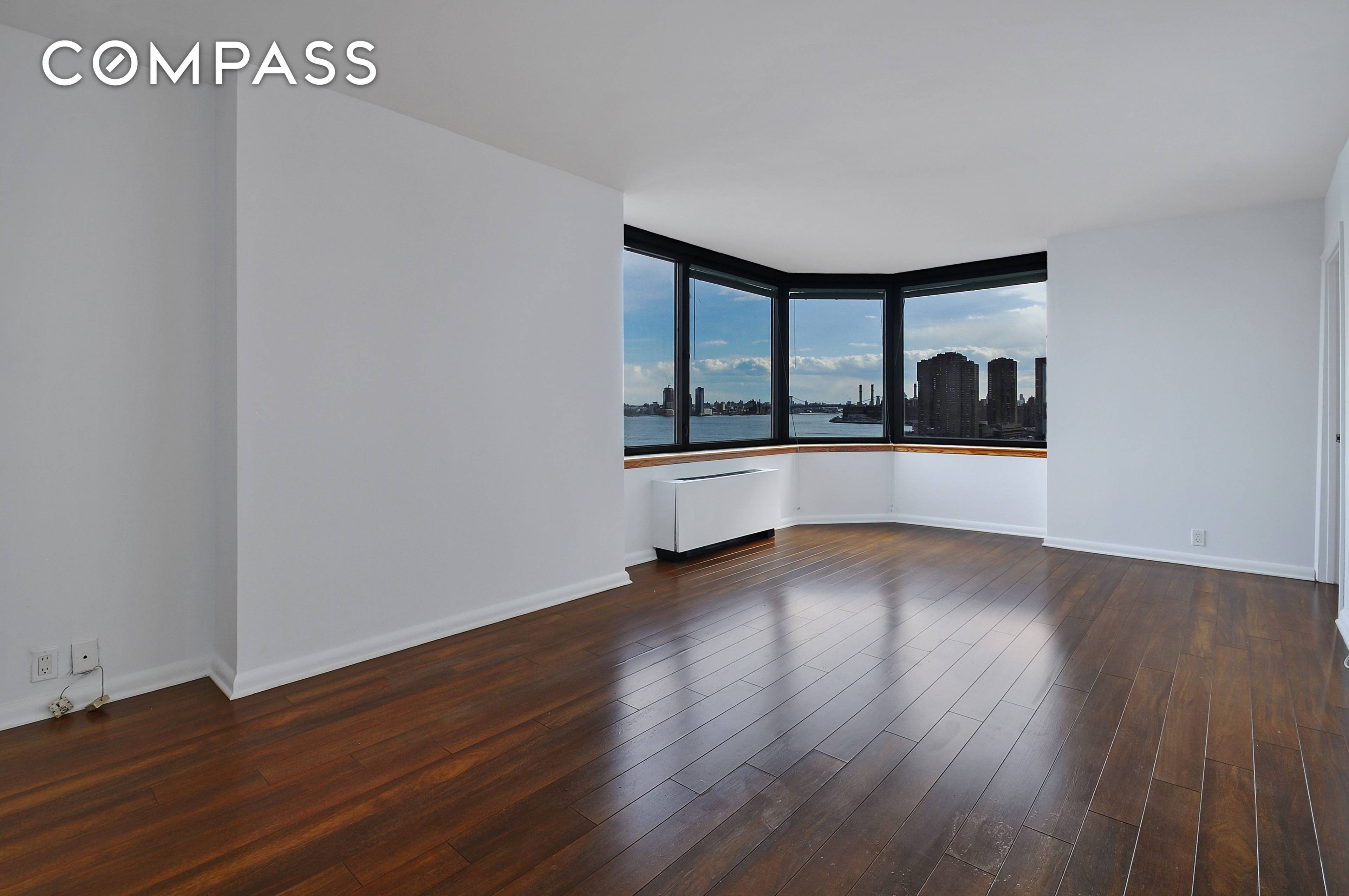 Welcome to 415 E 37th Street, 16F a two bed, two bath home with incredible, unobstructed open views of the East River.