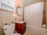 2nd Floor Full bathroom featuring a single vanity, a tiled shower/tub combination, and a white toilet