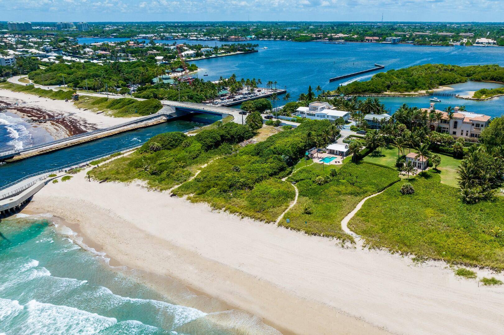 Rare Ocean to Lake double lot property with 250 feet of lake frontage and 235 feet of ocean frontage.