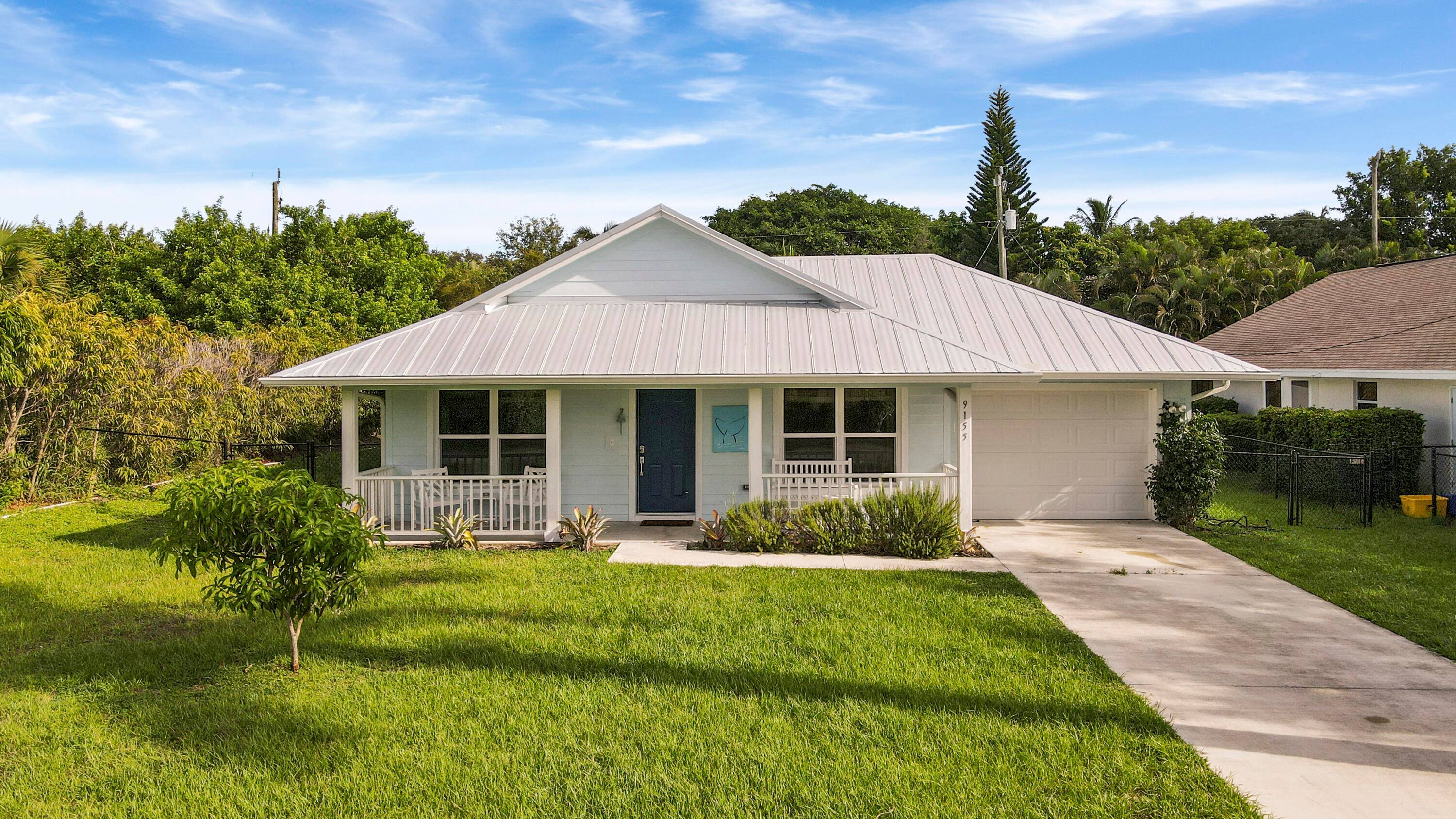 Beautiful Key West Style 3 bed 2 bath 1 car garage home that comes with access to the Hobe Sound Boat Ramp Dock !