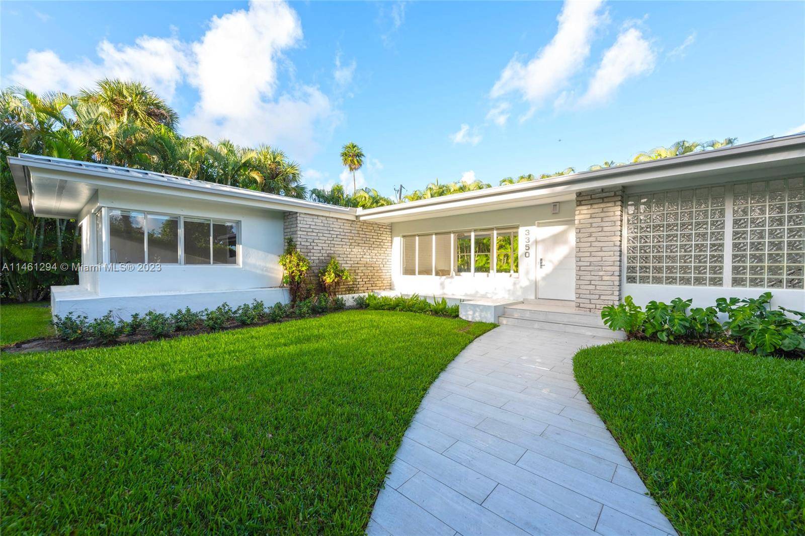 Bright, beautiful and renovated mid century modern home centrally located in a quiet residential street, with walking bridges 2 blocks from the ocean.