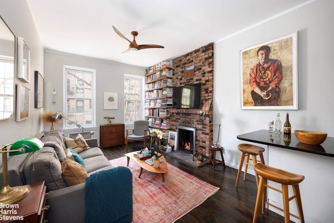 Welcome to this charming one bedroom featuring a cozy wood burning fireplace nestled in the heart of Chelsea.