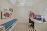 Guest Bedroom 1 with additional 10x10 room for an office/seating area or workout room
