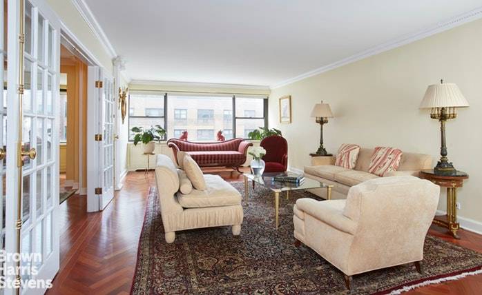 Beautifully situated on the 9th floor of an elegant full service Sutton Place building, this two bedroom, two and a half bath apartment is incredibly bright, open, and spacious.