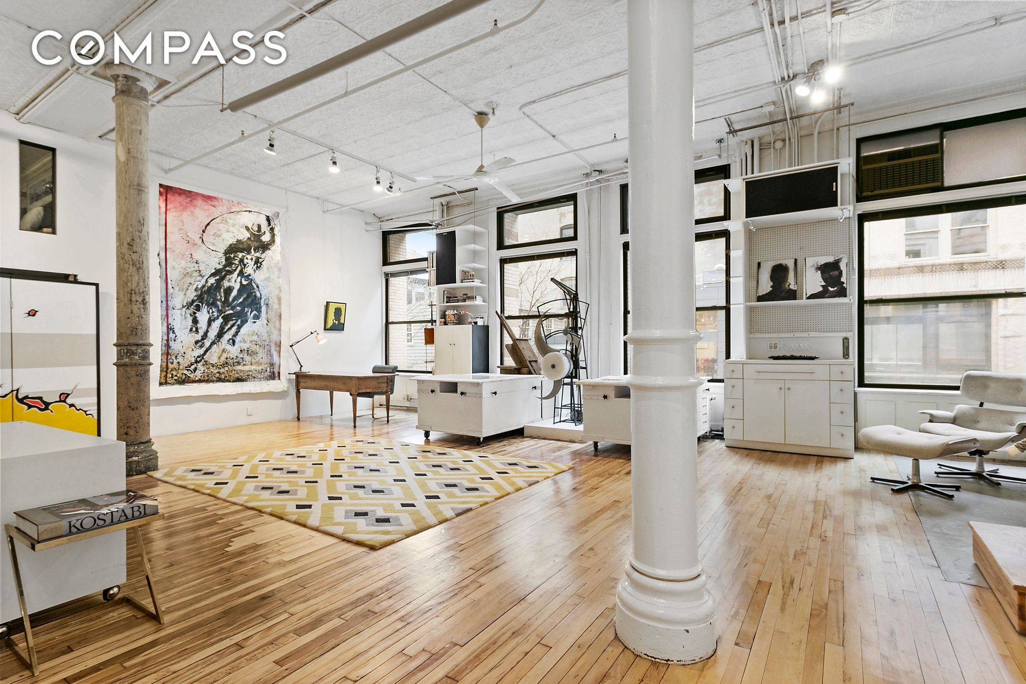 Available fully or partially furnished, authentic true artist s loft in one of Soho s best condominium buildings, located at the prized corner of Spring and Wooster Streets, directly above ...