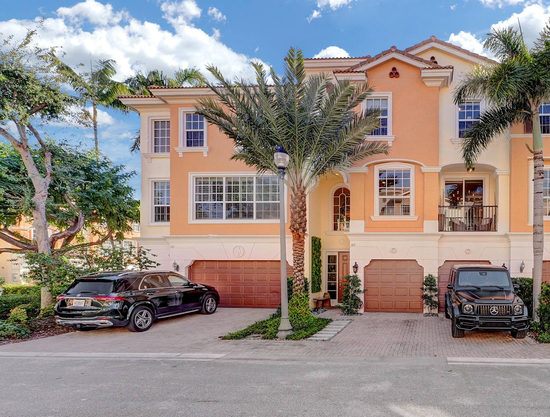 Presenting an exquisite luxury townhome crafted by Toll Brothers, ideally situated in the heart of East Boca Raton.