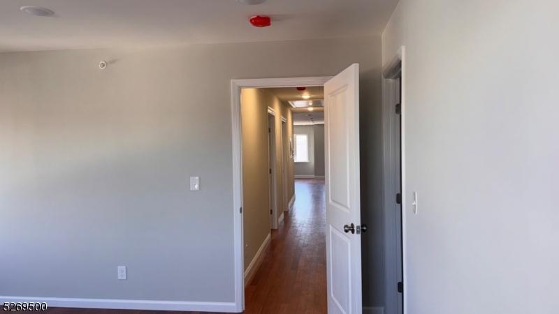 Hallway view from primary bdrm