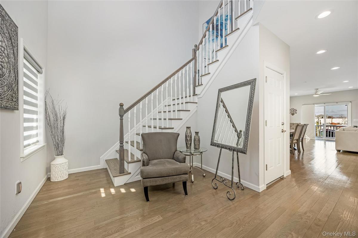 Entryway featuring cathedral ceilings !