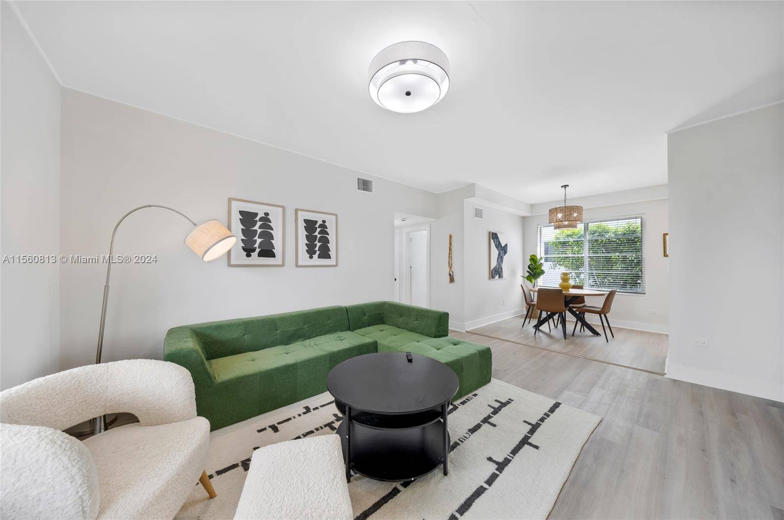 Nestled within the tranquil ambiance of Miami Beach's serene neighborhood, this charming apartment offers an ideal blend of comfort and convenience.