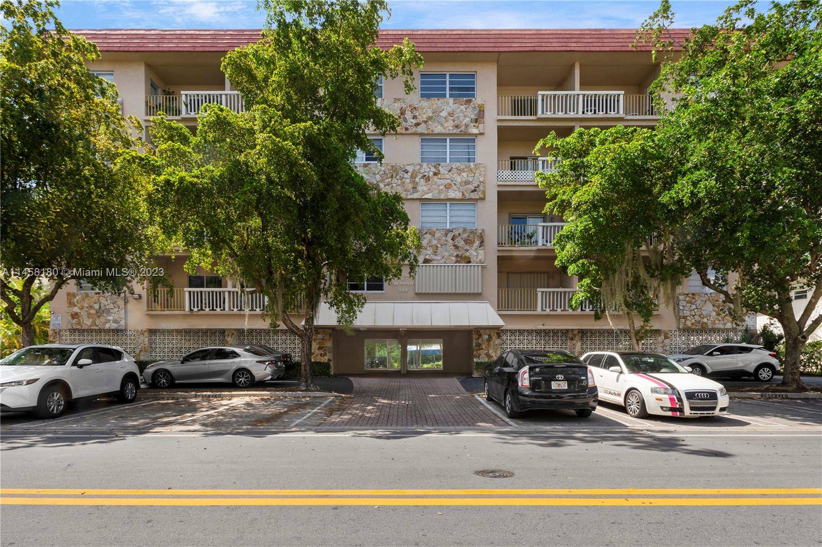 Discover this stunning corner unit in Bay Harbor Islands !