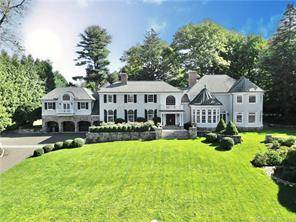 Located in Darien with captivating water views, this estate, formerly owned by the Ziegler family, underwent a complete reconstruction in 2004.