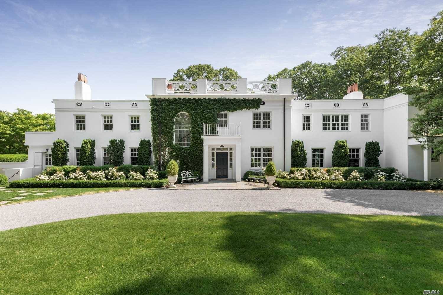 Magnificent Estate with water views over Cold Spring Harbor awaits your escape from the city.