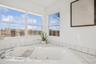 Full bathroom with a whirlpool tub