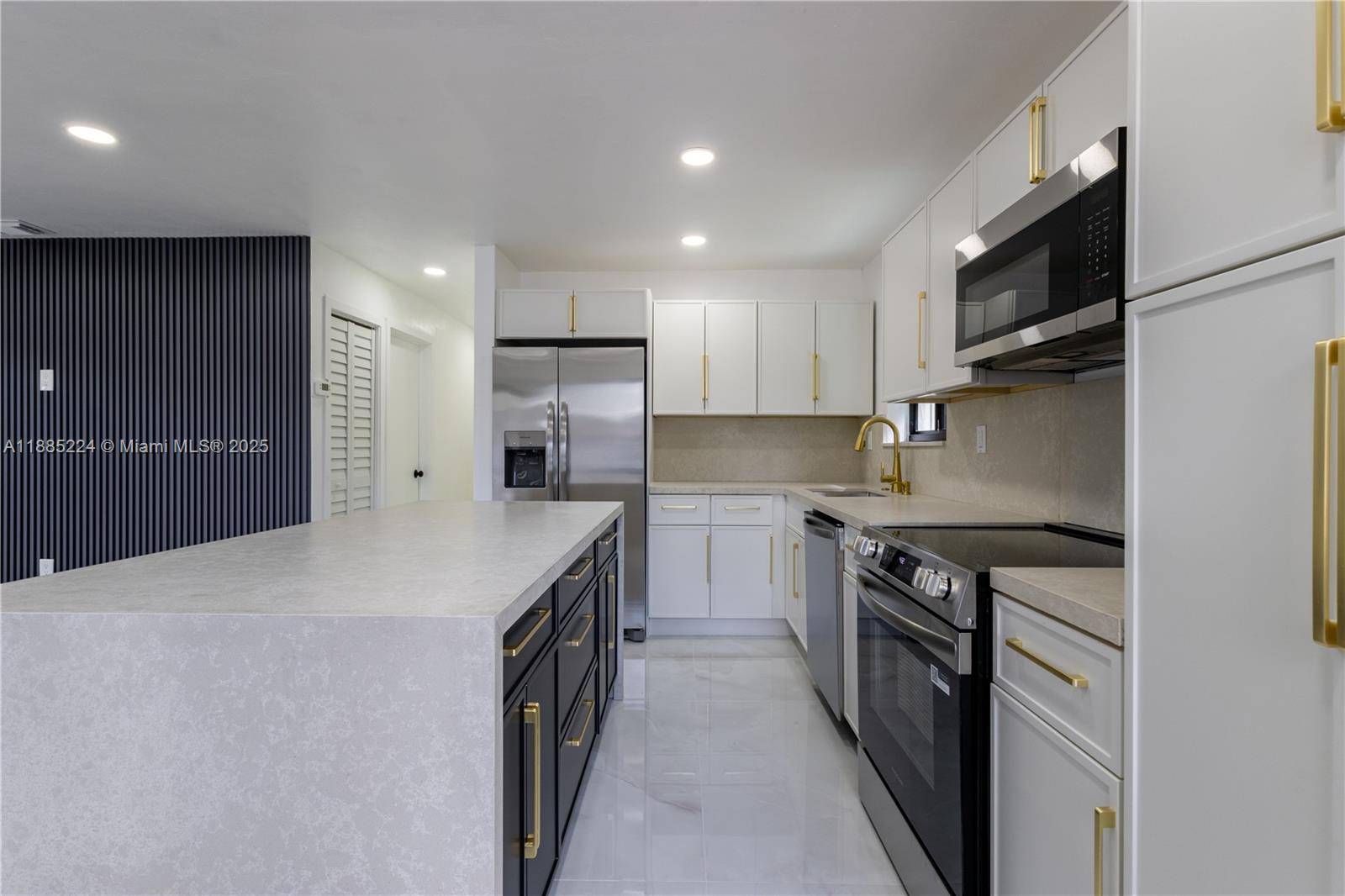 Beautifully renovated 3 bedroom, 2 full bath residence in Miami, featuring a brand new roof 2025, new central A C, hurricane impact windows and doors, and a designer kitchen with ...