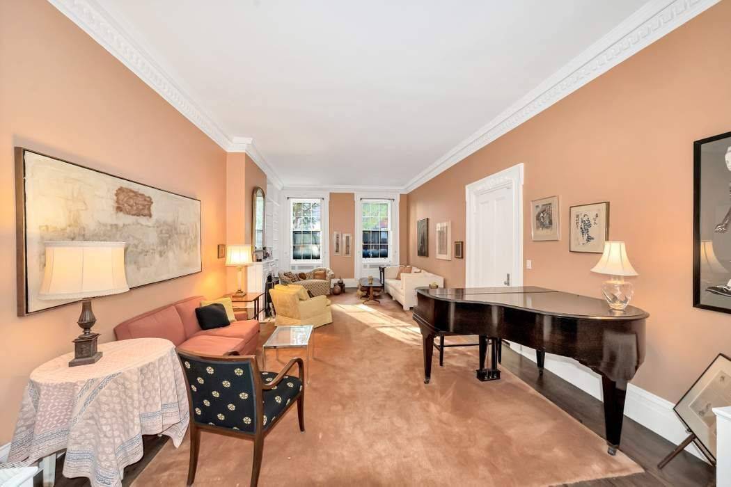 A wonderful opportunity presents itself to own a stately 4 story townhouse on one of the best blocks in New York's Greenwich Village.