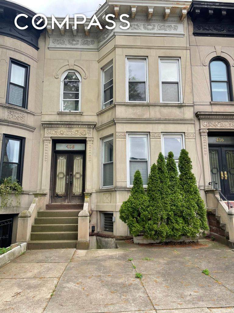 Welcome to 418 Bay Ridge Parkway, a beautiful limestone townhouse located on historic doctor's row boasting curb appeal and historic original details within.