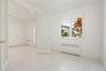 Foyer entrance with radiator and recessed lighting