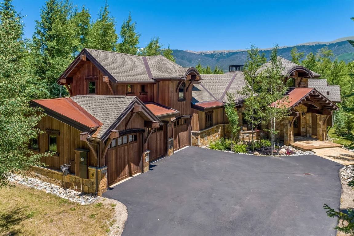 Welcome to 170 Arnica, an immaculate 5 bedroom, 7 bathroom home cradled by aspens on a private oversized lot in Silverthorne s exclusive Three Peaks community.