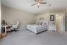 Oversized primary bedroom offering comfort, privacy, and generous square footage.