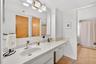 Primary bath with separate counter space and sinks