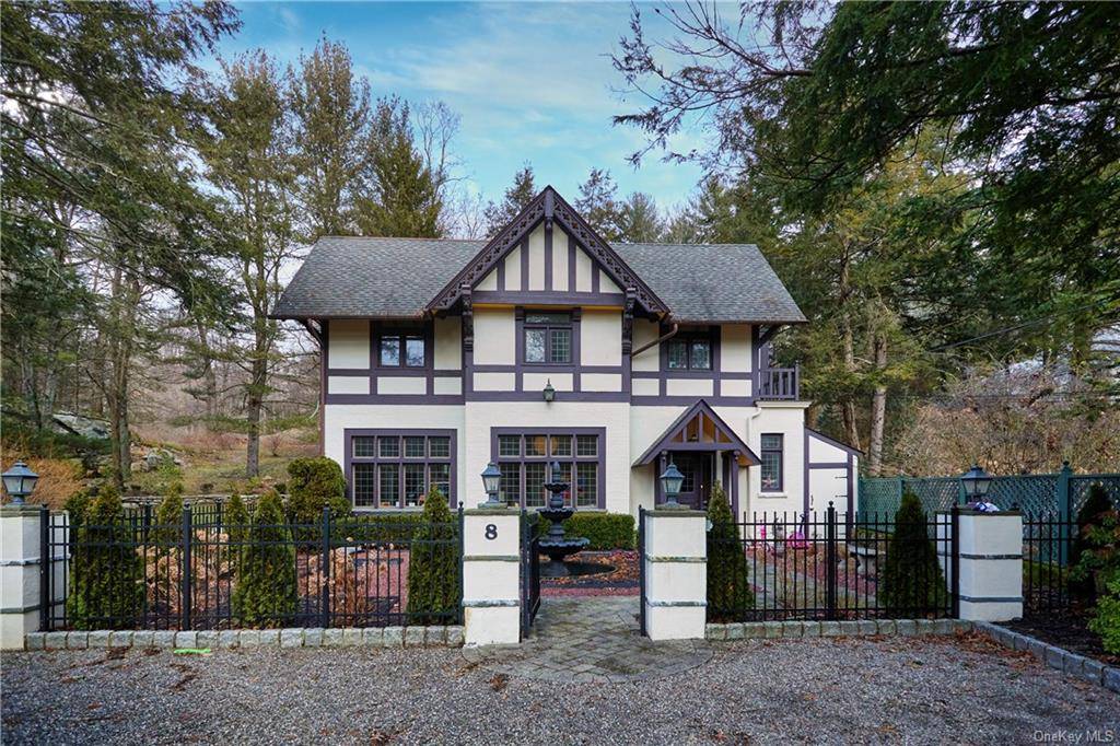 A modern renovated, historic 4 bedroom Tudor cottage within the gated Village of Tuxedo Park NY.